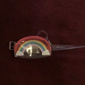 A rainbow glitter pouch belt